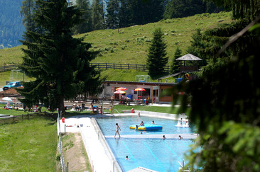 Swimming pool and large forest playground complete the offer