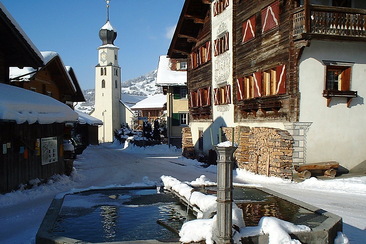 Beautiful houses line the village square