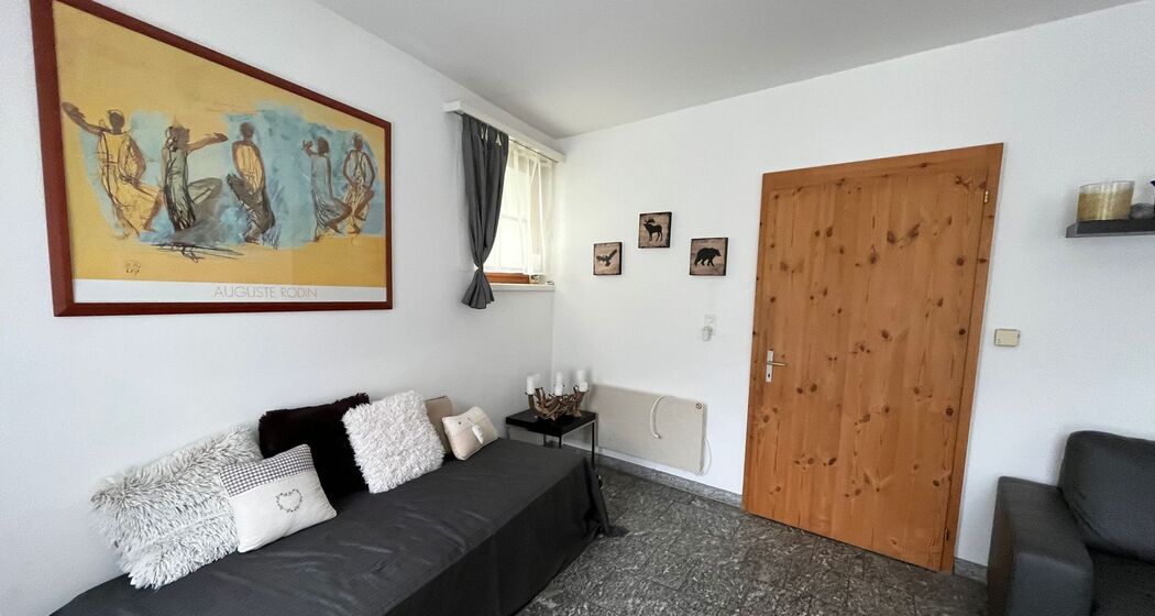 Wohnzimmer Ferienwohnung Luzi Bergün