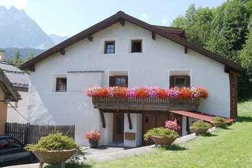 Main entrance with guest parking