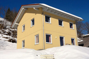 Ferienhaus Bual da Rumein - Hausansicht Winter von SW