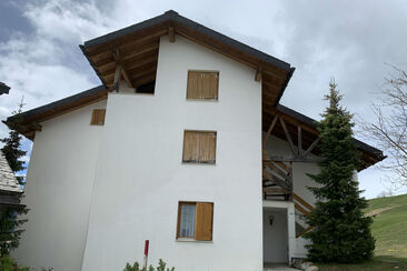 Ferienwohnung Sur Mulins Willmann - Ansicht Sommer