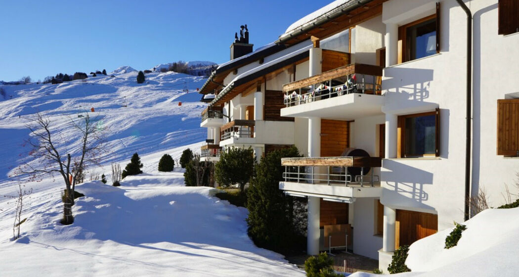 Ferienwohnung Sur Mulins 12.4 - Ansicht Winter