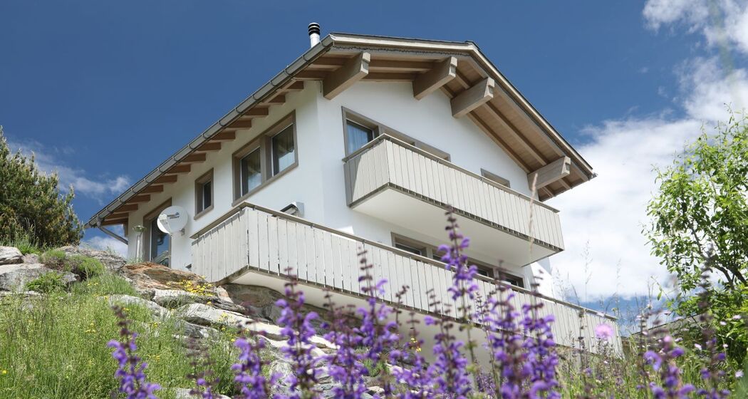 Ferienhaus Davos Munts - Ansicht Sommer