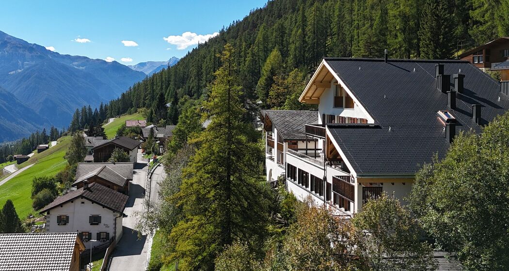Aparthotel Muchetta Davos Wiesen - Aussenansicht RSüd.jpg