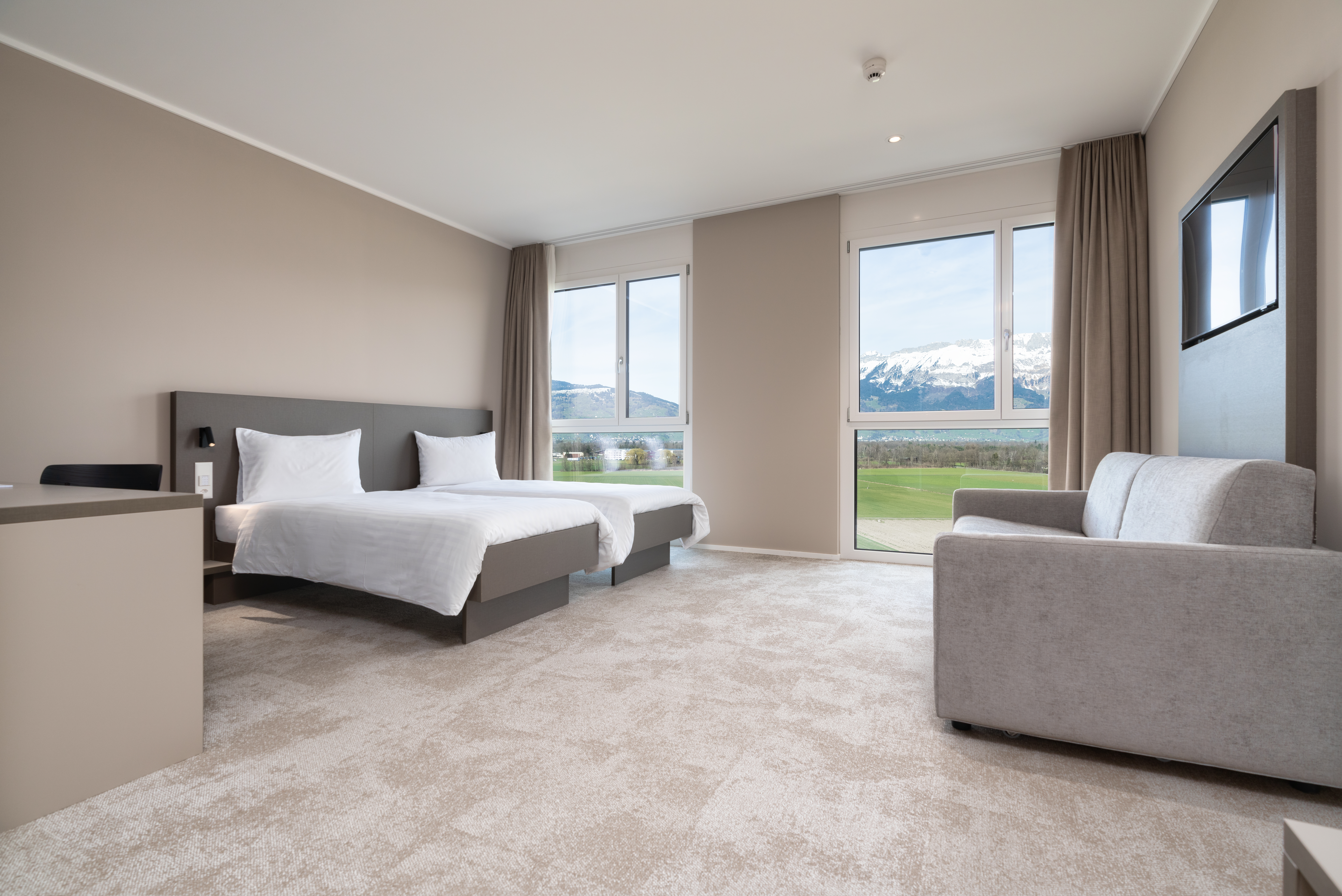 Helles und modernes Zweibettzimmer im b_smart motel