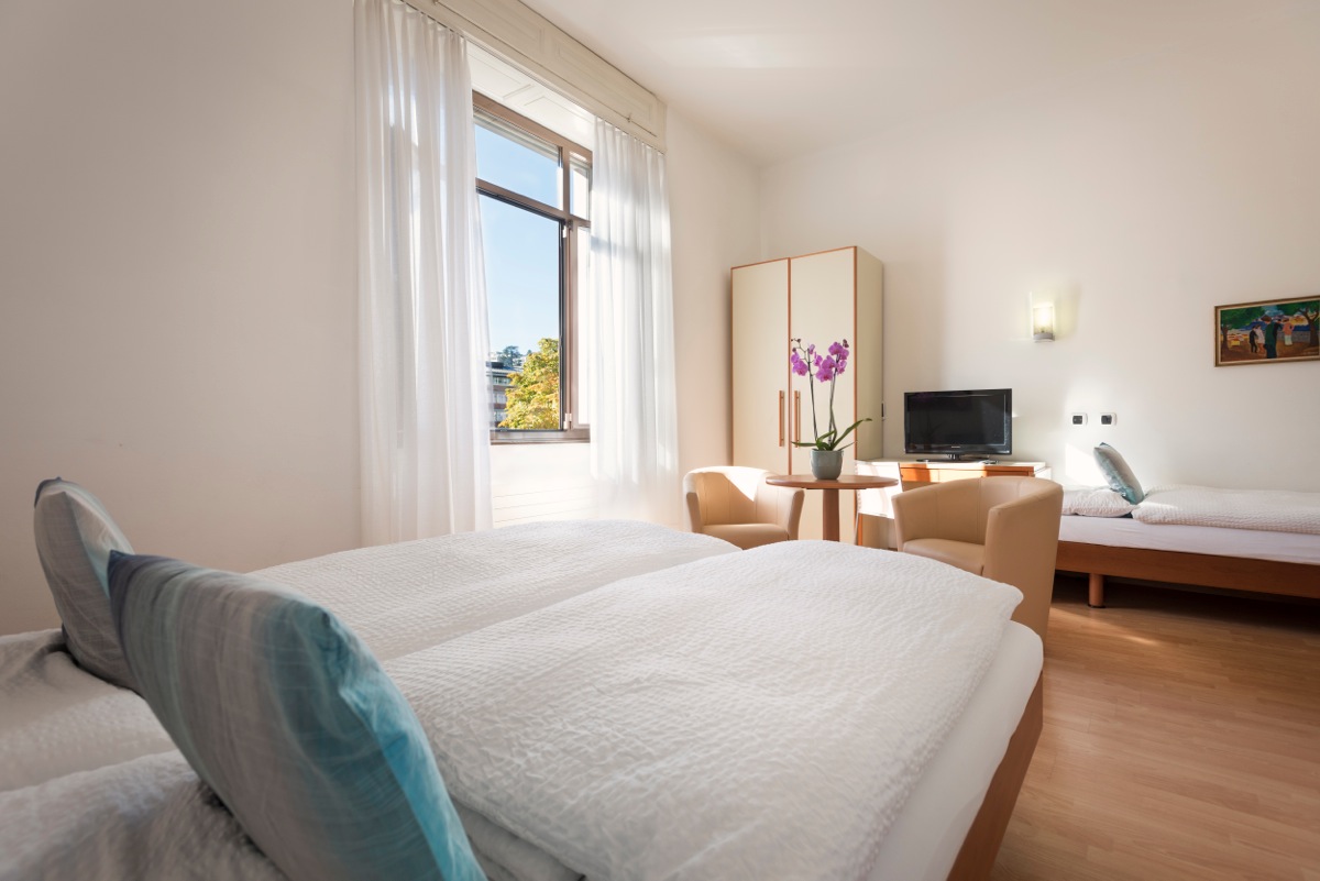 Camera tripla Camera tripla